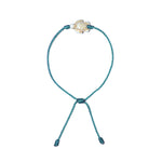 White Howlite Turtle Bracelet (Light Blue String)